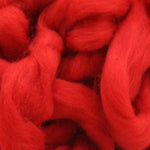 close up of corrie wool top for felting in red colour