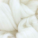 close up of corrie wool top for felting in undyed white colour