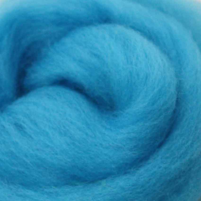 close up of corrie wool top for felting in zing blue colour