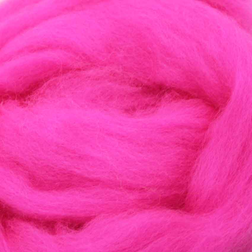 close up of corrie wool top for felting in zing pink  colour