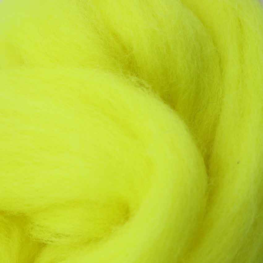 close up of corrie wool top for felting in zing yellow colour