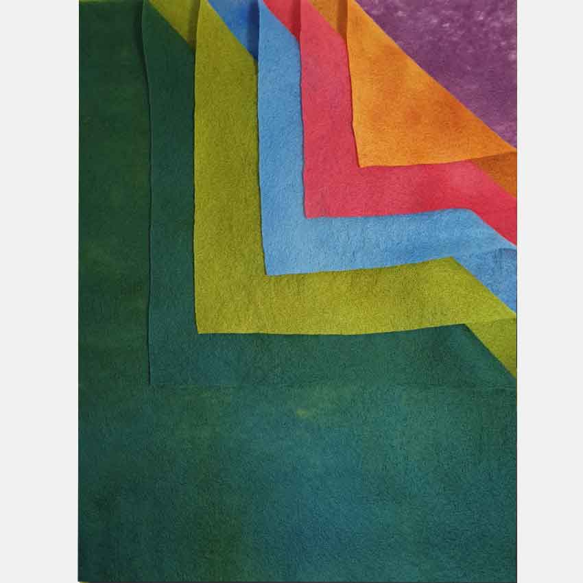 Hand dyed Felbi allsort for wet felting showing 6 pices 35x45cm Puple,Burnt orange, red, light blue, light green and dark green.