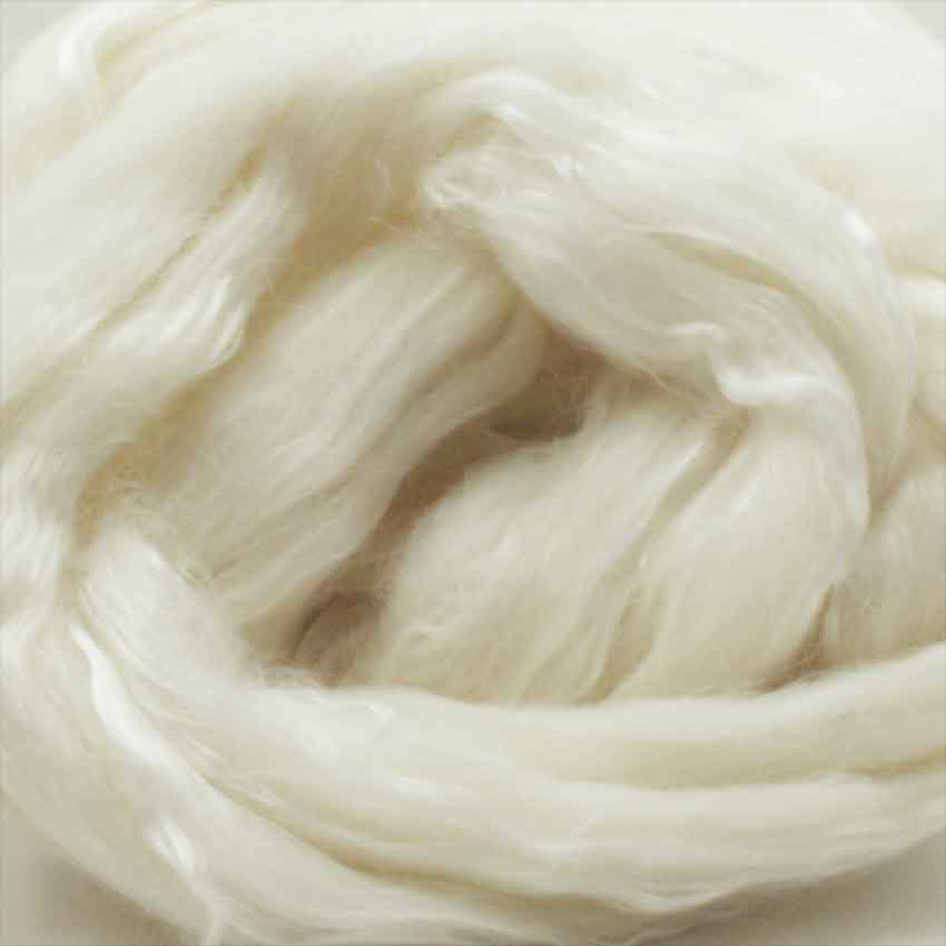 close up of top or roving showing the lustre of the silk amongst the wool